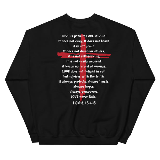 Back of black sweater with LOVE scriptures printed and red Jesus cross in the background