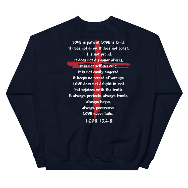 Back of navy sweater with LOVE scriptures printed and red Jesus cross in the background.