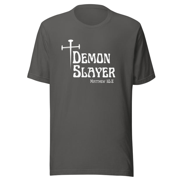 Grey t-shirt that has a white cross then reads Demon Slayer in white text and Matthew 10:8 in grey text.