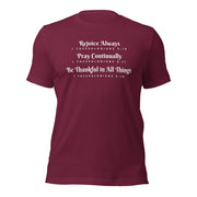 Maroon unisex t-shirt that has the scripture, 1 Thessalonians 5:16-5:18, Rejoice Always, Pray Continually, Be Thankful in  All Things