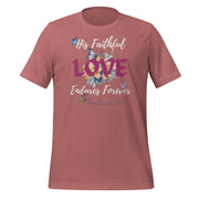 Mauve tee with scripture that reads "His Faithful Love Endures Forever" Psalms 136. Tee also has flowers and butterflies.