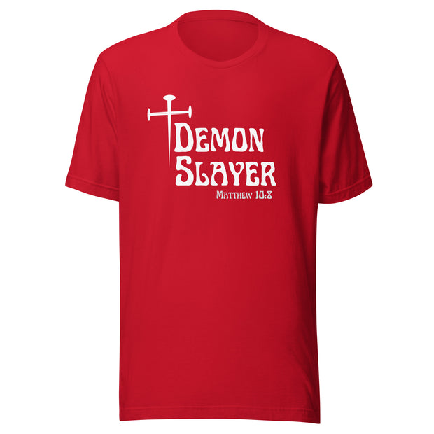 Red t-shirt that has a white cross then reads Demon Slayer in white text and Matthew 10:8 in grey text.
