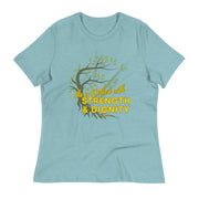 Pastel blue t-shirt with image of tree branched over the scripture "She is clothed with strength and dignity" Proverbs 31:25. Tree is dark olive with green leaves. Lettering is yellow.