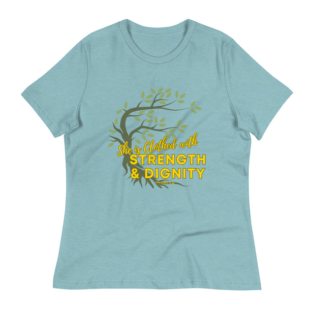 Pastel blue t-shirt with image of tree branched over the scripture "She is clothed with strength and dignity" Proverbs 31:25. Tree is dark olive with green leaves. Lettering is yellow.