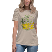 Young women wearing cream t-shirt with image of tree branched over the scripture "She is clothed with strength and dignity" Proverbs 31:25.  Tree is dark olive with green leaves.  Lettering is yellow.